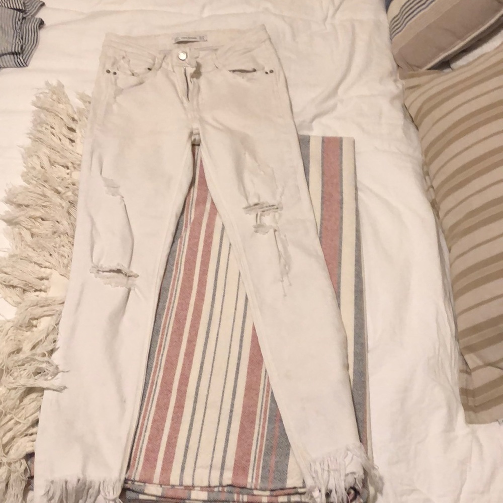 Zara frayed and knee ripped jeans